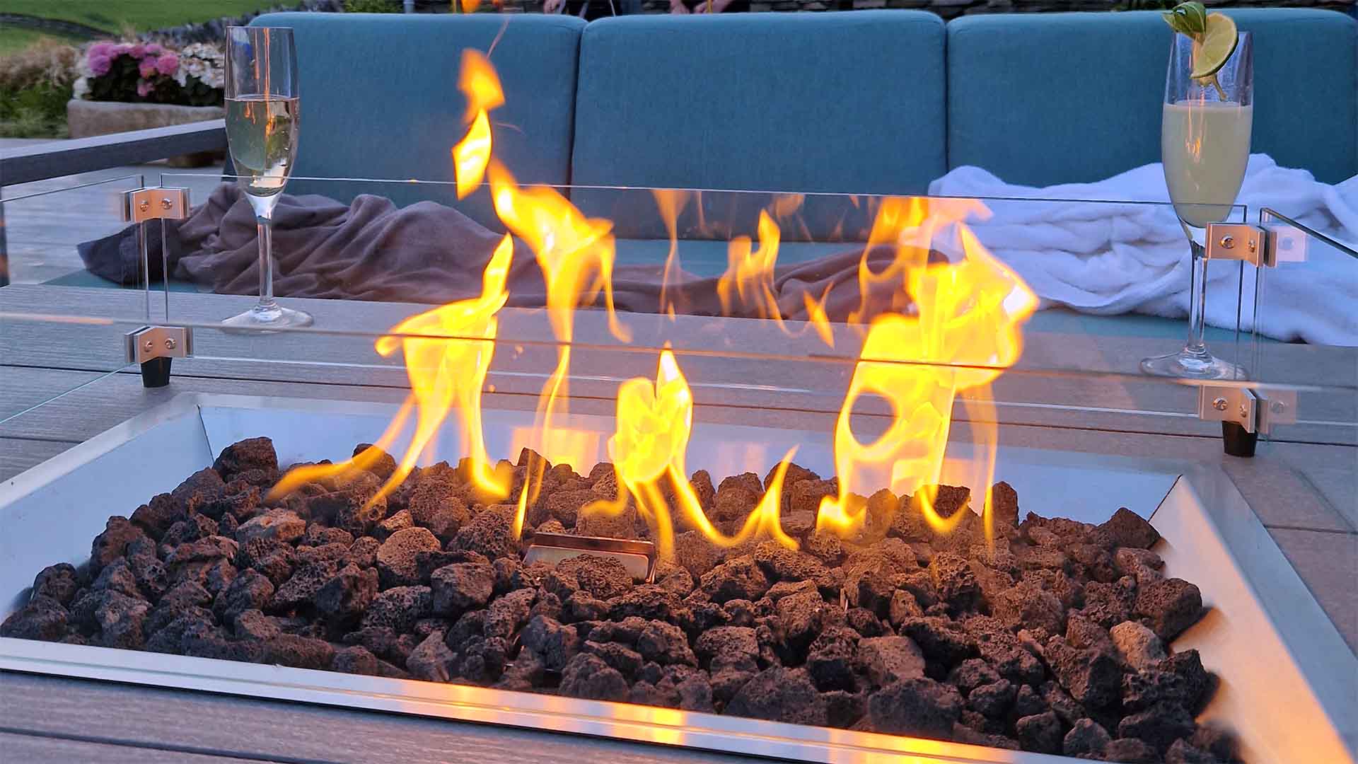 Poolside seats and firepit