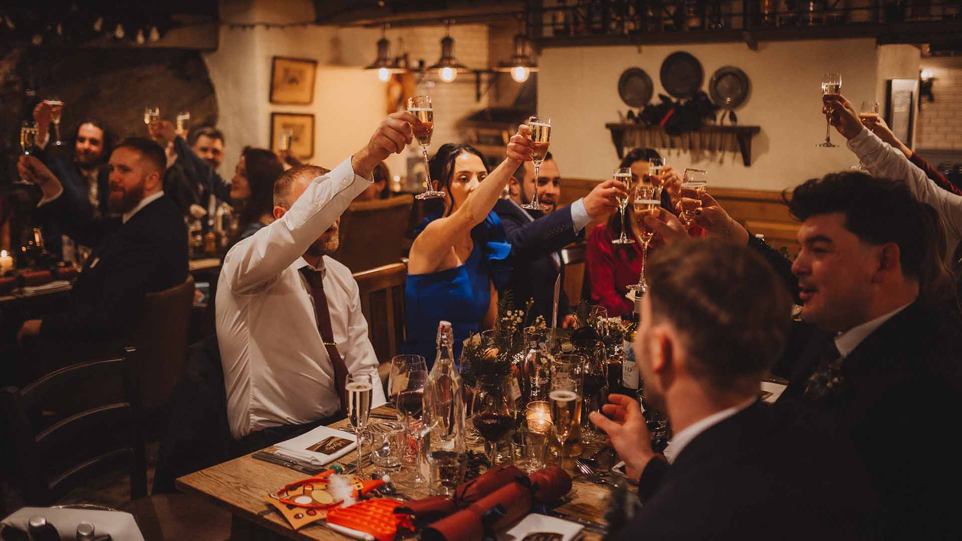 Guests raising a toast in the inn's restaurant