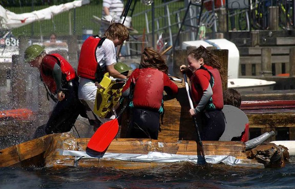 Children playing in boat race