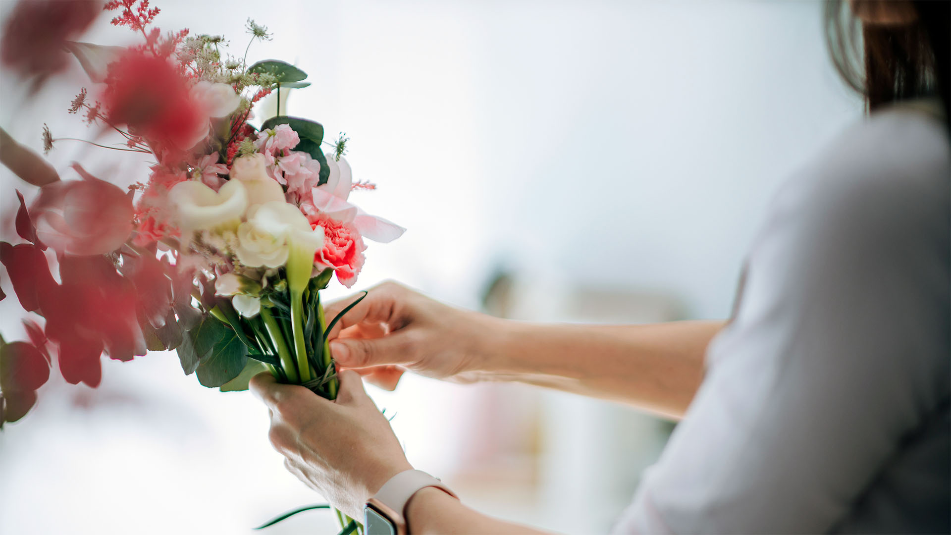 Woman holding a bouquet of flowers